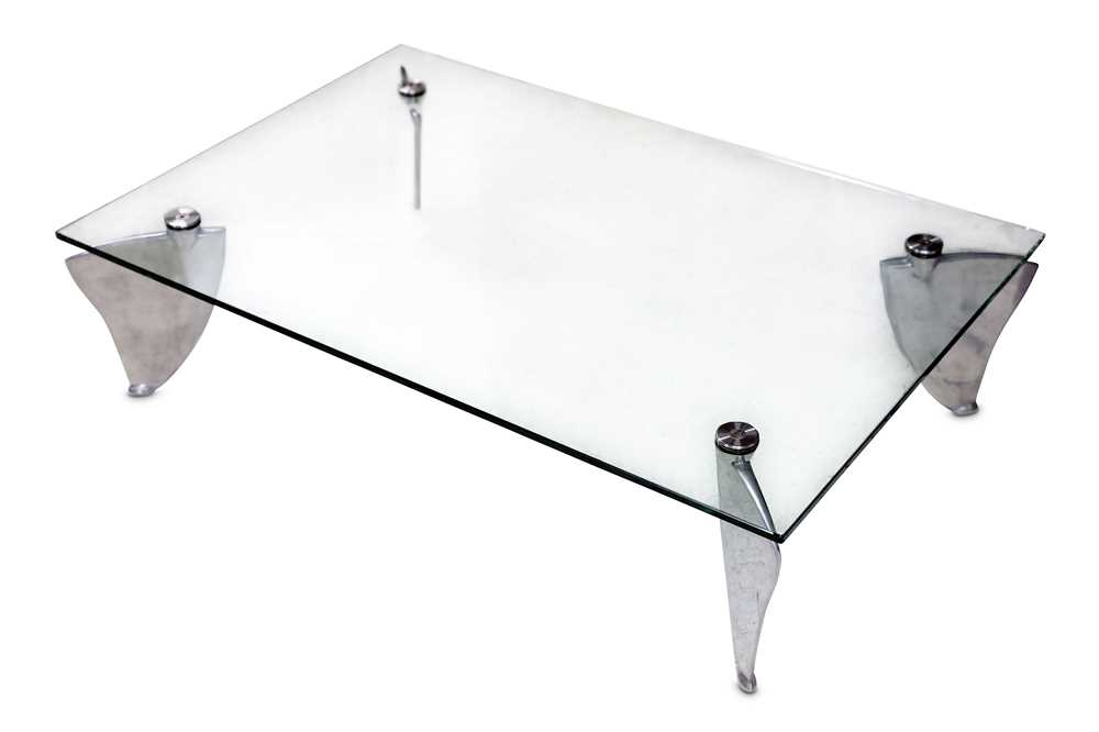 Lot 855 - A later 20th Century glass top coffee table by...