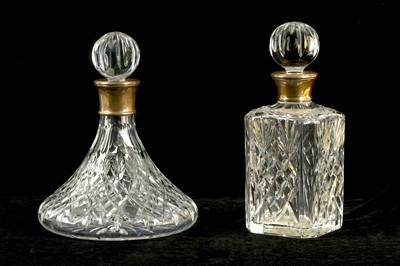 Lot 580 - Two later 20th Century cut glass decanters,...