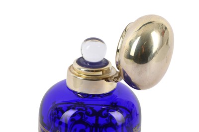 Lot 584 - A modern blue glass silver overlay scent...