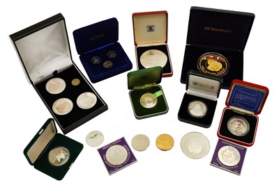 Lot 591 - A collection of silver and gold plated on...