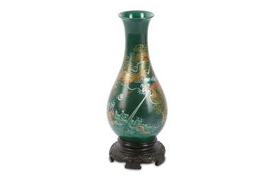 Lot 663 - A Chinese lacquered wood vase of baluster form,...