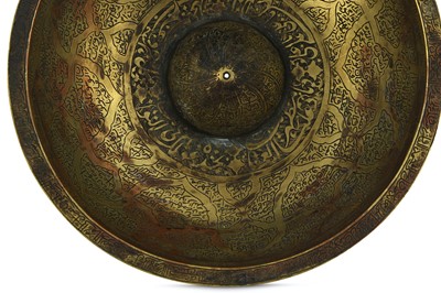 Lot 183 - A BRASS ENGRAVED MAGIC BOWL