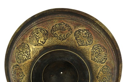 Lot 183 - A BRASS ENGRAVED MAGIC BOWL