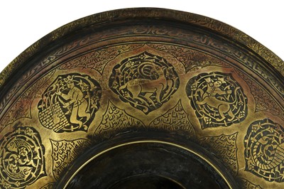 Lot 183 - A BRASS ENGRAVED MAGIC BOWL