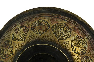 Lot 183 - A BRASS ENGRAVED MAGIC BOWL
