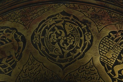 Lot 183 - A BRASS ENGRAVED MAGIC BOWL