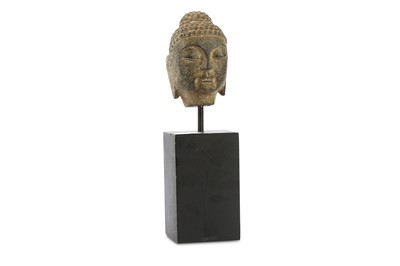 Lot 648 - A Chinese stone carving of a Buddha head...