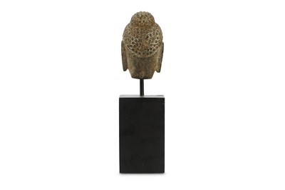 Lot 648 - A Chinese stone carving of a Buddha head...