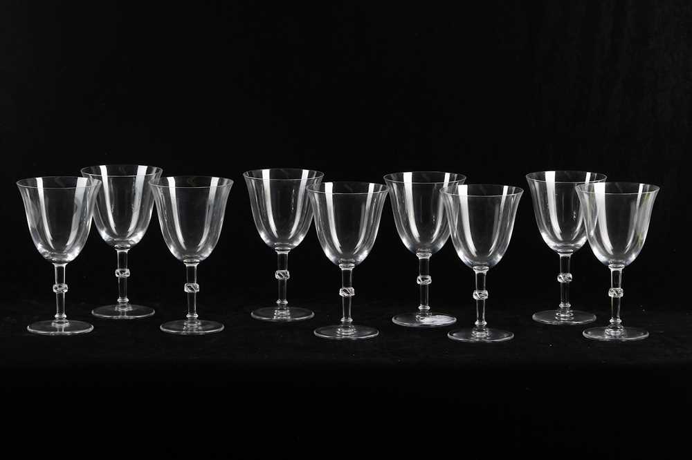 Lot 496 - A set of nine 1980s Lalique crystal wine...