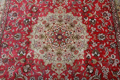 Lot 44 - AN EXTREMELY FINE SIGNED SILK QUM CARPET,...
