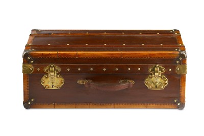 Lot 743 - A French leather suitcase with brass mounts...