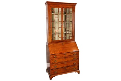 Lot 752 - A George III oak bureau bookcase with a dentil...