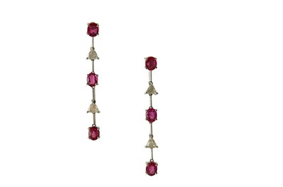 Lot 138 - A pair of pink sapphire and diamond earrings...