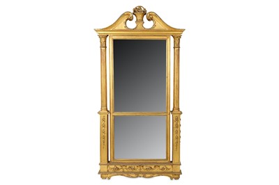 Lot 83 - AN EARLY 19TH CENTURY GILTWOOD MIRROR carved...