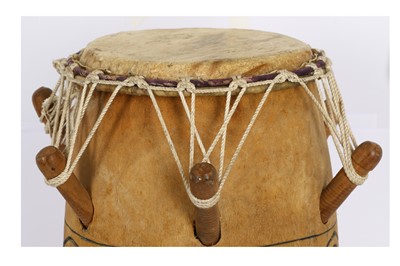 Lot 303 - AN AFRICAN WOOD DRUM With an ovoid body,...