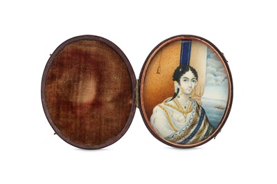 Lot 313 - λ FOUR INDIAN IVORY MINIATURES WITH FEMALE PORTRAITS