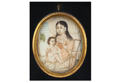 Lot 313 - λ FOUR INDIAN IVORY MINIATURES WITH FEMALE PORTRAITS