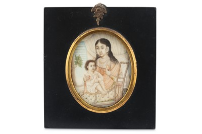 Lot 313 - λ FOUR INDIAN IVORY MINIATURES WITH FEMALE PORTRAITS