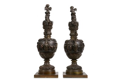 Lot 79 - A PAIR OF LATE 19TH CENTURY BRONZE EWERS AFTER...