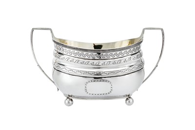 Lot 482 - A George III sterling silver three-piece tea service, London 1807, the teapot by Thomas Wallis II (reg. 15th Sep 1792)