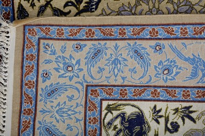 Lot 45 - AN EXTREMELY FINE PART SILK SIGNED ISFAHAN RUG,...