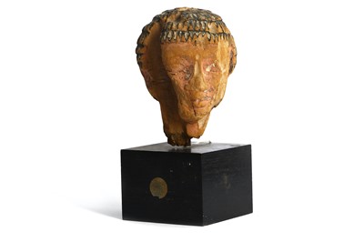 Lot 319 - AN EGYPTIAN  WOOD HEAD Carved in pale wood,...
