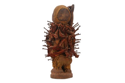 Lot 305 - WEST AFRICAN FETISH DOLL The wood figure is...