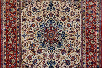 Lot 41 - AN EXTREMELY FINE PART SILK ISFAHAN RUG,...