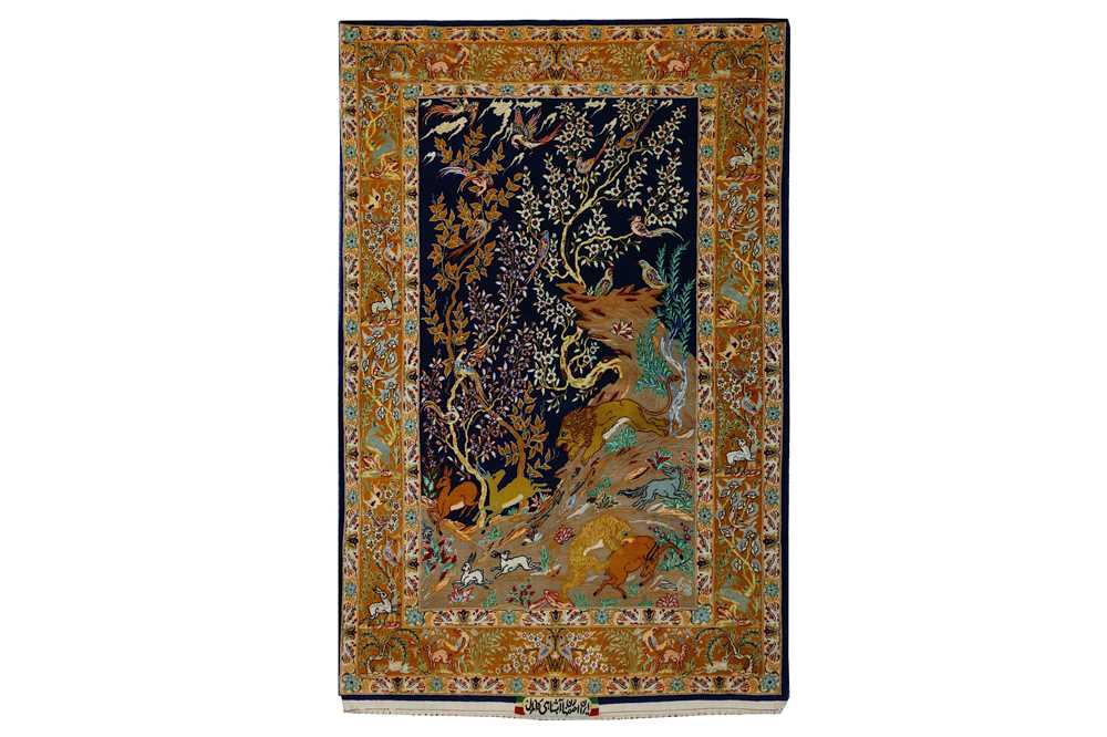 Lot 36 - AN EXTREMELY FINE PART SILK SIGNED ISFAHAN RUG,...