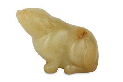 Lot 492 - A CHINESE PALE CELADON CARVING OF A DOG....