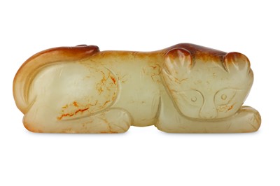 Lot 290 - A CHINESE PALE CELADON CARVING OF A CAT. Qing...