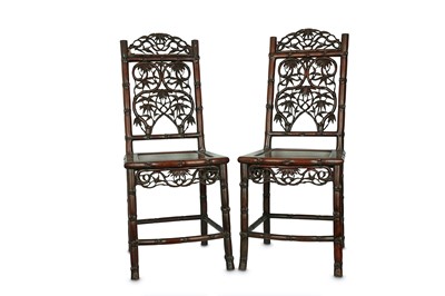 Lot 450 - A PAIR OF CHINESE HARDWOOD 'BAMBOO' CHAIRS....