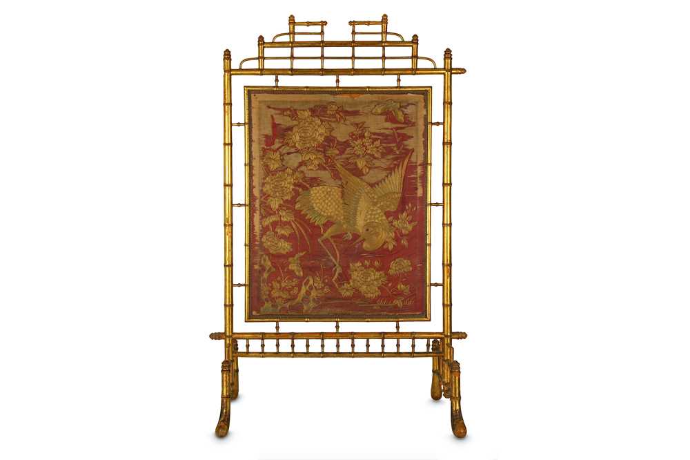 Lot 61 - A CHINESE EMBROIDERED RED-GROUND SILK PANEL....