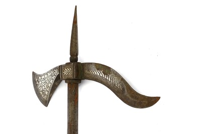 Lot 288 - An Indian silver-inlaid steel axe (tabarzin),...