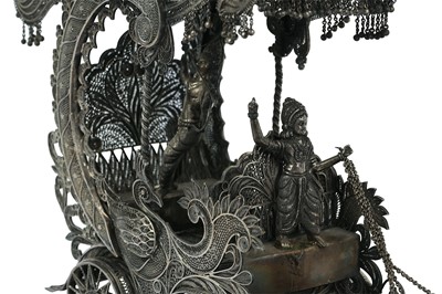 Lot 227 - AN INDIAN WHITE METAL FILIGREE CENTREPIECE OF A CHARIOT PULLED BY FOUR HORSES