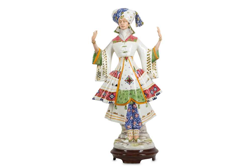 Lot 112 - A LARGE AND RARE GLAZED CERAMIC FIGURE OF A...