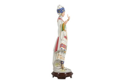 Lot 112 - A LARGE AND RARE GLAZED CERAMIC FIGURE OF A...