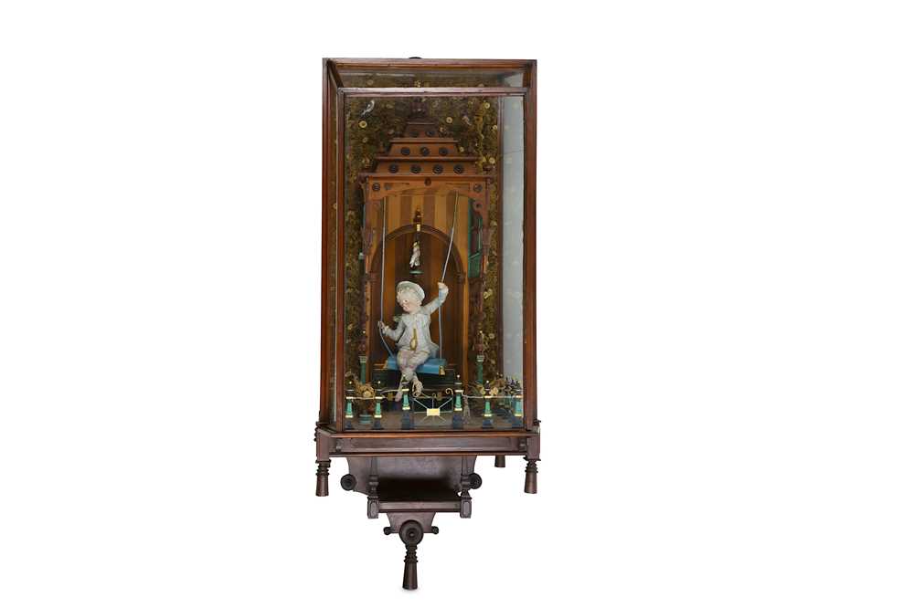 Lot 372 - A RARE LATE 19TH CENTURY AUTOMATON IN DISPLAY CASE DEPICTING A BOY ON A SWING, PROBABLY GERMAN