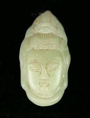 Lot 273 - Chinese jade pendant, bust of Guylin, 3.8cm.