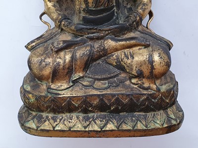 Lot 635 - A GILT-BRONZE FIGURE OF VAJRADHARA.