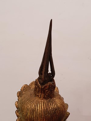 Lot 635 - A GILT-BRONZE FIGURE OF VAJRADHARA.