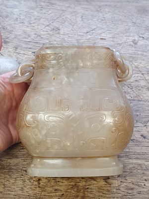 Lot 254 - A CHINESE CREAM JADE VESSEL AND COVER.