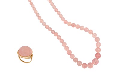Lot 170 - A rose quartz necklace and ring, The graduated...