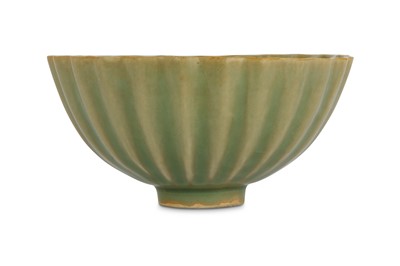 Lot 40 - A CHINESE RIBBED CELADON GLAZED BOWL. The...