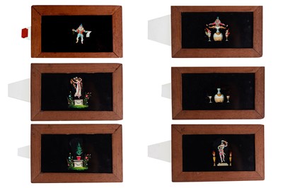 Lot 334 - A GROUP OF FOUR HAND PAINTED MAHOGANY MAGIC...