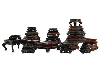 Lot 483 - A COLLECTION OF CHINESE WOOD STANDS. Qing...