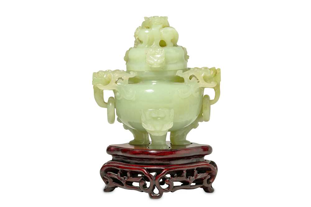 Lot 562 - A CHINESE CELADON JADE 'DRAGON' INCENSE BURNER AND COVER.