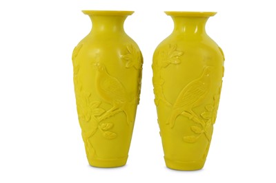 Lot 542 - A PAIR OF CHINESE BEIJING YELLOW GLASS 'BIRDS AND FLOWERS' VASES.