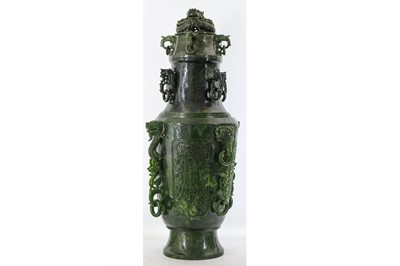 Lot 141 - A MASSIVE CHINESE SPINACH JADE 'DRAGON' VASE AND COVER.