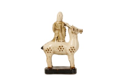 Lot 39 - A CHINESE POTTERY FIGURE OF SHOULAO ON A DEER.